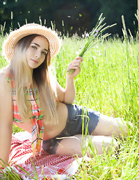 Brunette in the grass